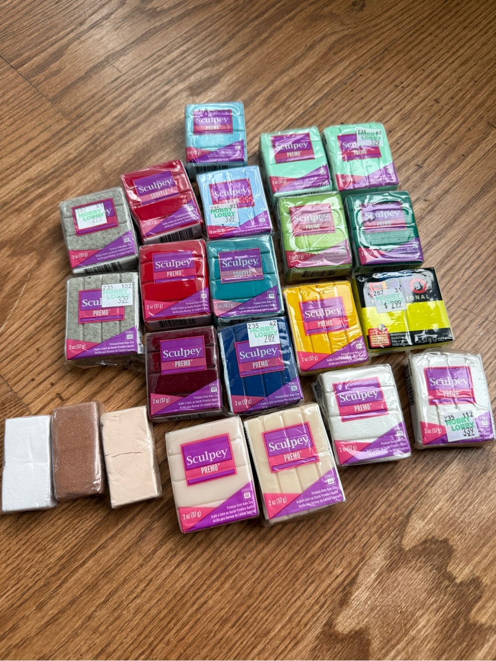 22 unopened packages of polymer clay - perfect for crafting!